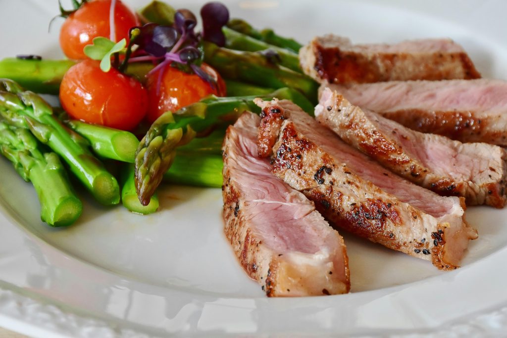 High protein dinner ideas with meat, vegetables on a table